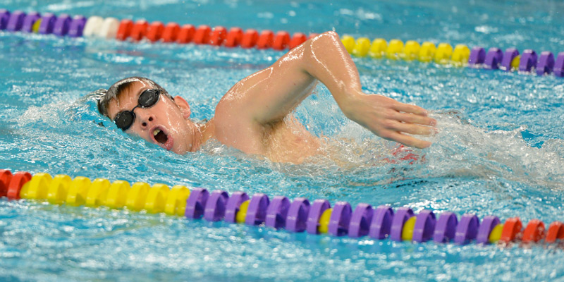 Swimming and diving teams get first wins of 2014-15