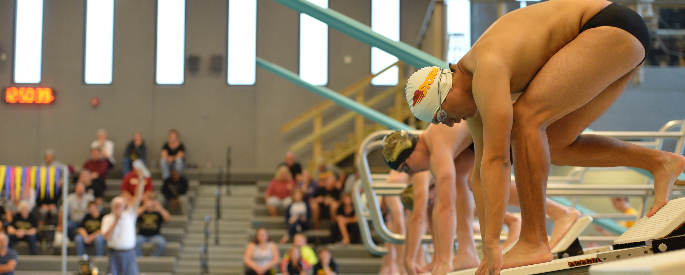 Men's swimming drops conference dual to Loras