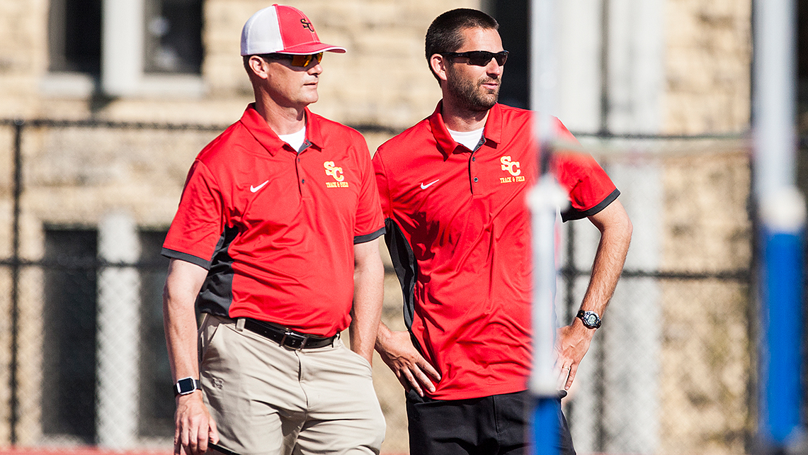 Photo of former Simpson College head track and field coach Dave Cleveland (left) and current director of track and field and cross country and head cross country coach, Heath Moenck (right).