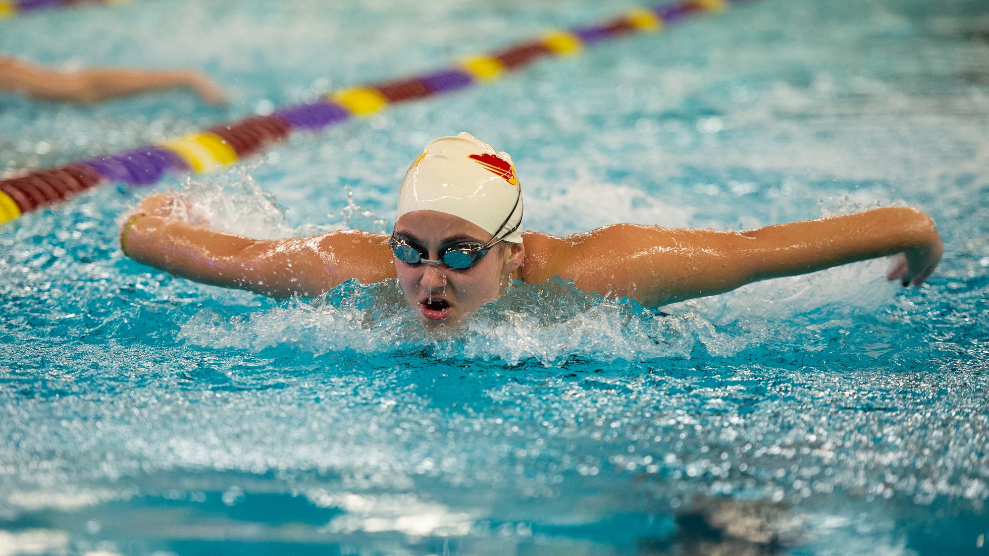 Storm swimmers compete against Coe in home debut